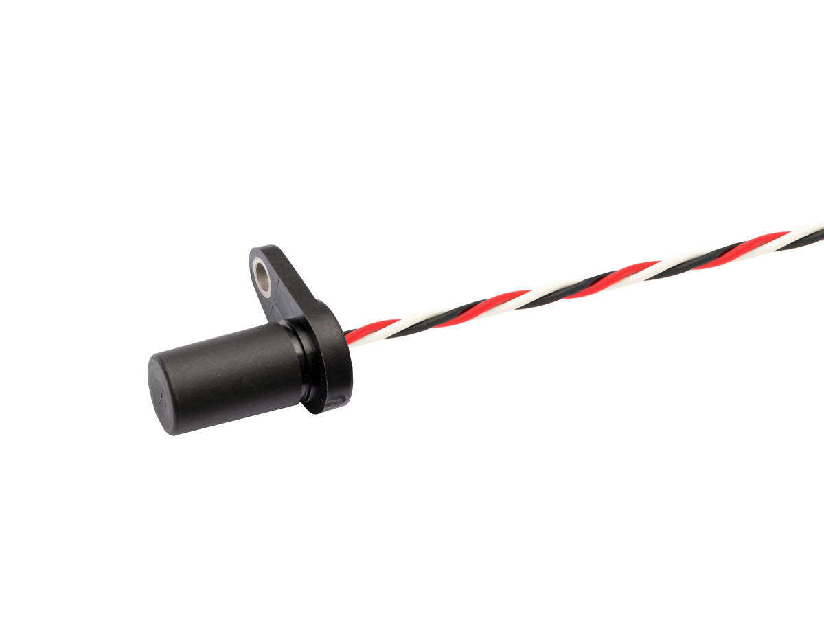 Close-up of a black cylindrical Hall Sensor from the DHS Series with a mounting bracket, attached to twisted red, white, and black wires on a white background. by Standex Detect