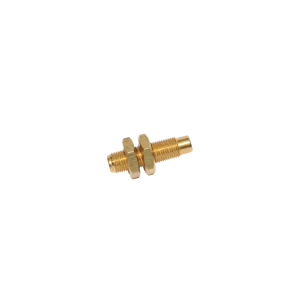 A brass threaded rod from the M11B Series Magnet, with two hexagonal nuts, positioned horizontally on a white background. by Standex Detect