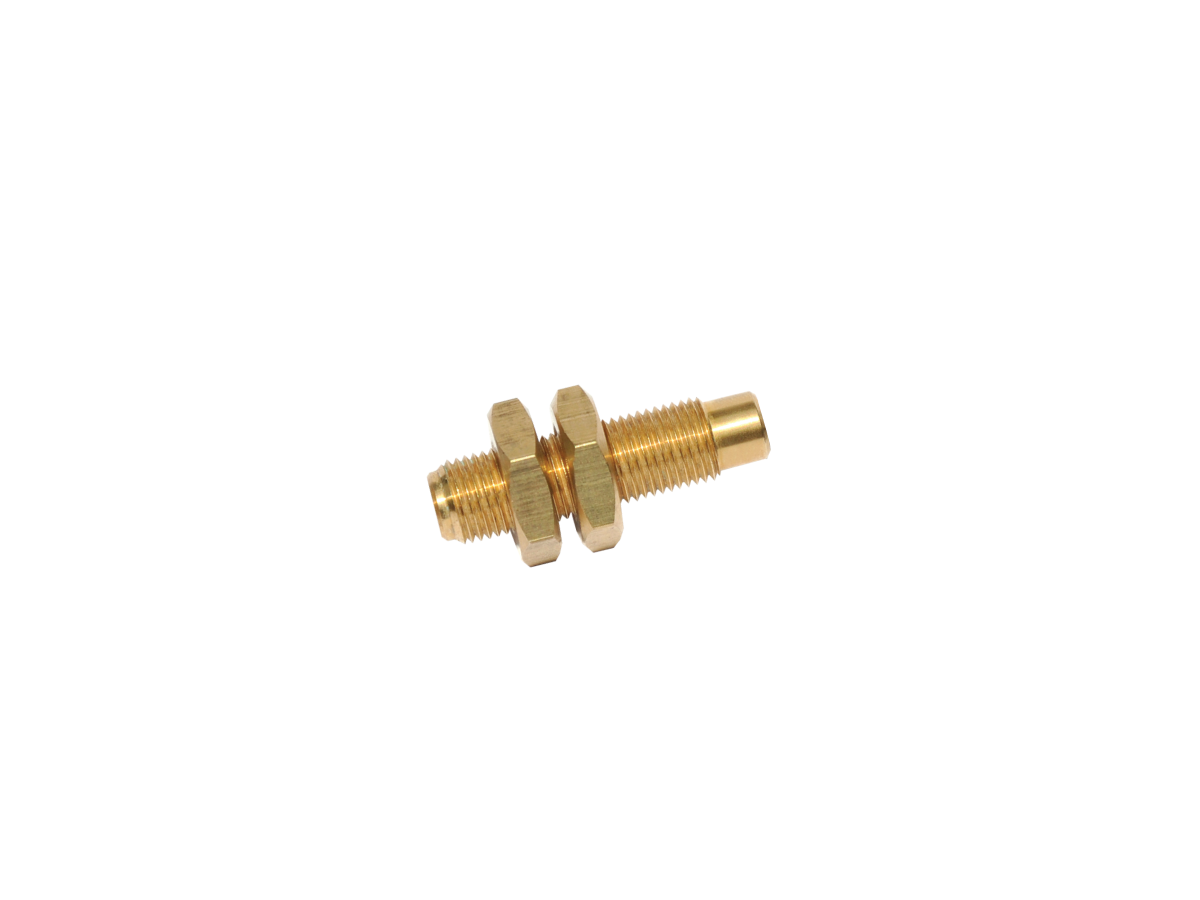 A small brass threaded connector from the M11B Series with two hexagonal nuts, positioned horizontally against a white background. by Standex Detect