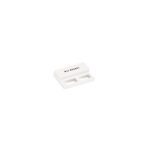 A small white rectangular M02 Series Magnet labeled M13 MAGNET, featuring two horizontal slots, placed on a plain white background. by Standex Detect