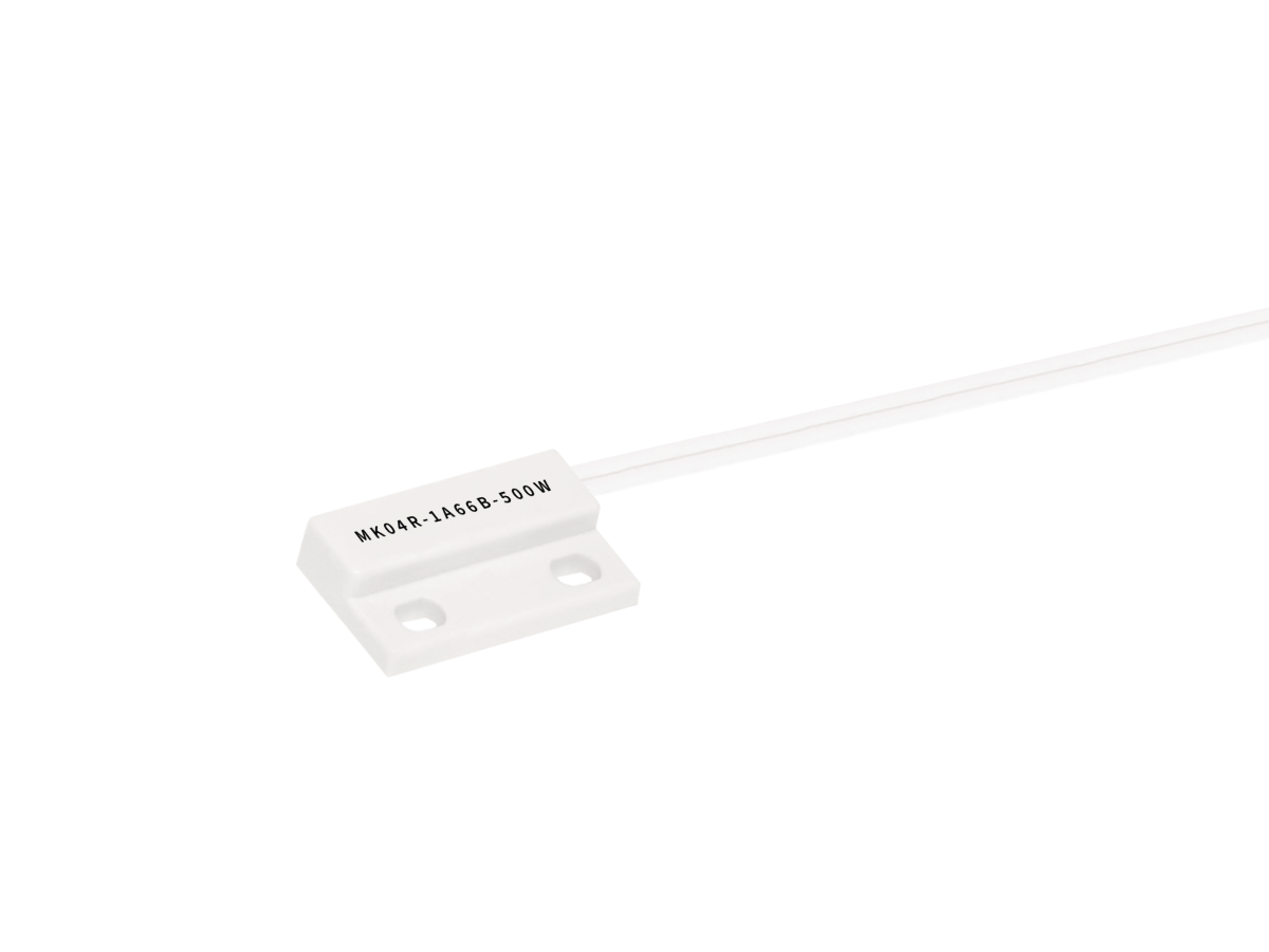 A white rectangular Reed Sensor from the MK04R Series with two mounting holes and a white cable attached, labeled “MK04R-1A66B-500W.”. by Standex Detect