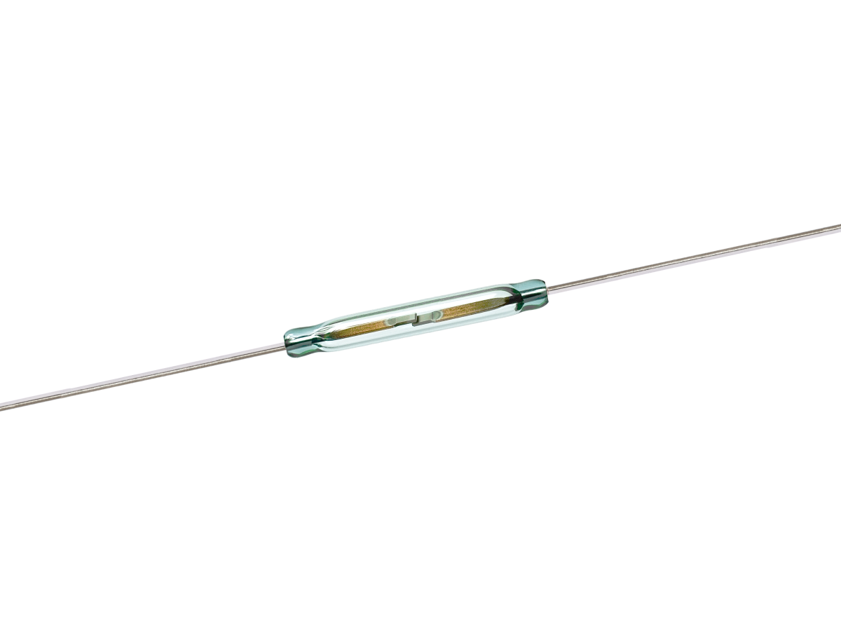 A small cylindrical glass KSK-1A85 Series reed switch with metal leads extending from both ends, showing internal metal contacts inside the transparent tube. by Standex Detect