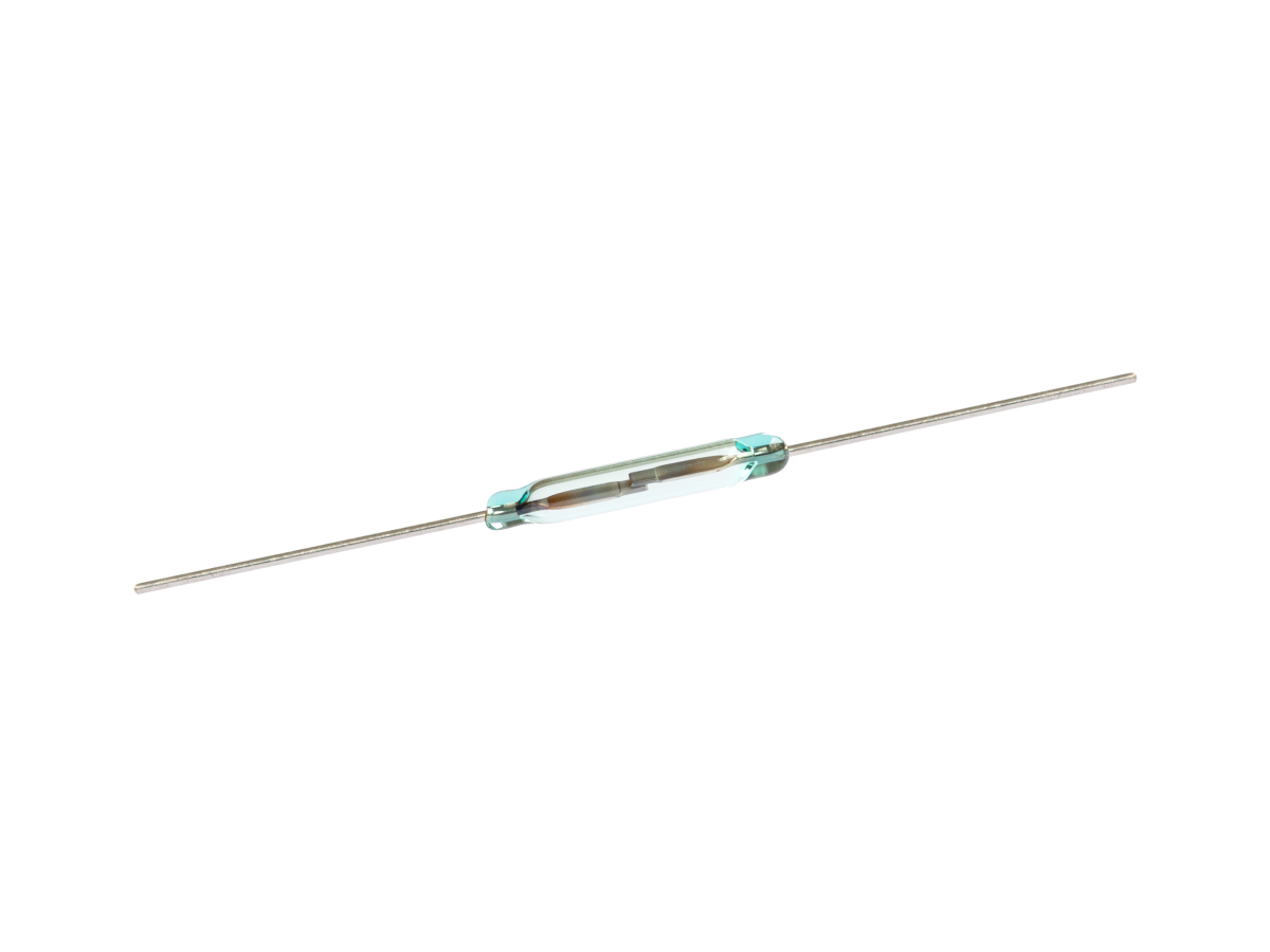 A close-up of an ORD624 Series reed switch with two metal leads extending from each end, encased in glass and isolated on a white background. by Standex Detect
