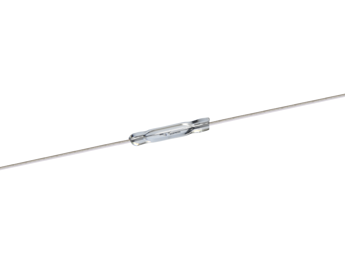 A small cylindrical PR560 Reed Switch with two long metal leads extending from each end, positioned horizontally against a white background. by Standex Detect
